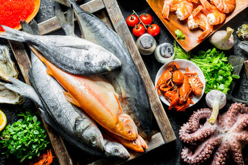 Sticker - Sea fish on tray with octopus, herbs and garlic.