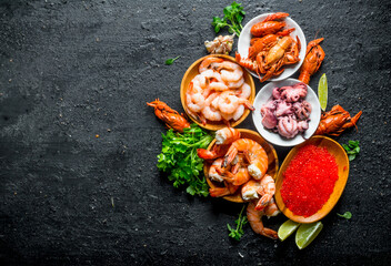 Sticker - Red caviar with seafood, parsley and lime slices.