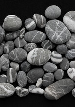 Variety Gray Pebbles With White Quartz Veins Inside Vertical Photo For Backgrounds
