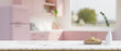 © bongkarn - White marble kitchen tabletop with empty space over blurred beautiful pastel pink kitchen room