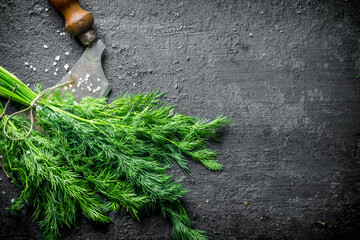 Poster - Freshly cut dill with a knife.