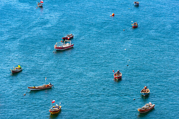 View from above of little fishing boats in the coasts of Antofagasta, Chile