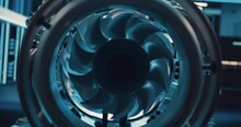 Cinematic Footage Of A Rotating Fan Working Inside A High Tech Prototype Turbine Engine. Advanced Jet Engine Research And Development In A Factory Facility With Modern Equipment