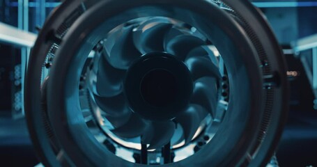 Leinwandbilder - Industrial High Tech Sustainable Electric Turbine Motor in a Factory Workshop. Tech Facility with Servers, Computers and Research Equipment. Zoom Out Footage From Inside the Engine with Spinning Fan