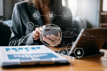 Wall Mural - api application programming interface, woman using laptop, tablet and smartphone with virtual screen