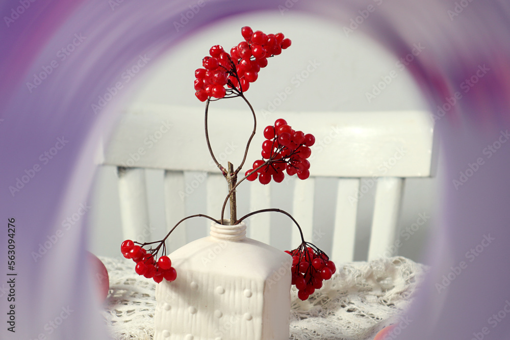 Winter still life: a bouquet of viburnum branches with red berries ...
