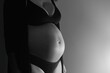 © Tunatura - Beautiful body of pregnant young mother. Pregnancy, maternity and parenting concept.