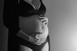 © Tunatura - Beautiful body of pregnant young woman with mothers hands touching the belly.
