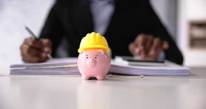Piggy Bank With Construction Hard Hat
