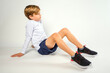 © 3Days2Go Media - Little boy sitting casually on the floor with knees up