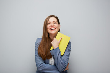 Teacher or smiling student girl portrait. Young business woman holding book..