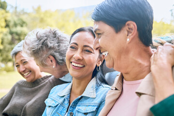 Canvas Print - Friends, park and senior women laughing at funny joke, crazy meme or comedy outdoors. Comic, face and happy group of retired females with humor bonding, talking and enjoying time together in nature.