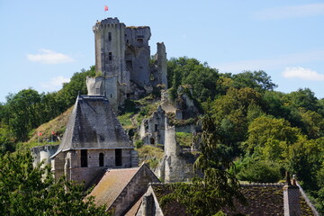 Wall Mural - old stone ruins of a country castle above the village of Lavardin in France on a spring day