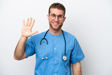 Poster - Young surgeon doctor caucasian man isolated on white background counting five with fingers