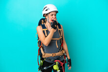 Young Italian Rock-climber Woman Isolated On Blue Background Yawning And Covering Wide Open Mouth With Hand