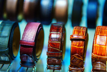 Rows Of Men's Trouser Straps Made Of Different Types Of Leather And Colors