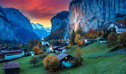 Fototapete - Fantastic nature landscape in Swiss alps during sunset. Famous Lauterbrunnen valley, Staubbach waterfall, Europe. Amasing vivid alpine scenery with picturesque sky. Concept of an ideal resting place.
