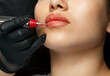 Cosmetician in gloves applying permanent makeup