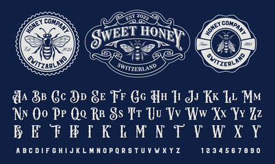 set of vintage honey labels templates with vintage font on a dark background
