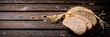 © Artem Shadrin - Slices of sliced bread on a table with a spike.
