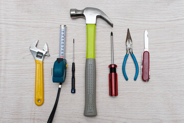 Various household tools such as hammer and tape measure screwdriver