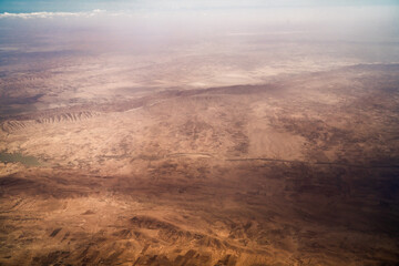 Wall Mural - Aerial view of south landscape in Tunisia during the flight Monastir to Tozeur- Tunis