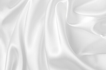 Wall Mural - Abstract white fabric texture background. Cloth soft wave. Creases of satin, silk, and cotton.