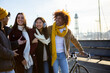 © Xavier Lorenzo - Group of multi-ethnic happy friends walking on street and talking together. Male and female teenage joyful student people enjoying funny conversation outdoors. Leisure time and friendship concept
