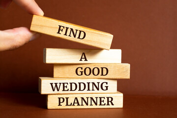 Poster - Wooden blocks with words 'FIND A GOOD WEDDING PLANNER'.