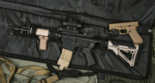 Weapons And Military Equipment For Army, Assault Rifle Gun (M4A1) And Handgun 9mm On Rifle Case.