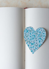 Wall Mural - scrapbook paper heart on open book with blank pages