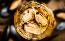 Delicious Pickled Mussels In A Glass Jar. 