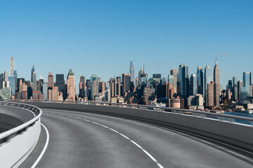 Empty urban asphalt road exterior with city buildings background. New modern highway concrete construction. Concept of way to success. Transportation logistic industry fast delivery. New York. USA.