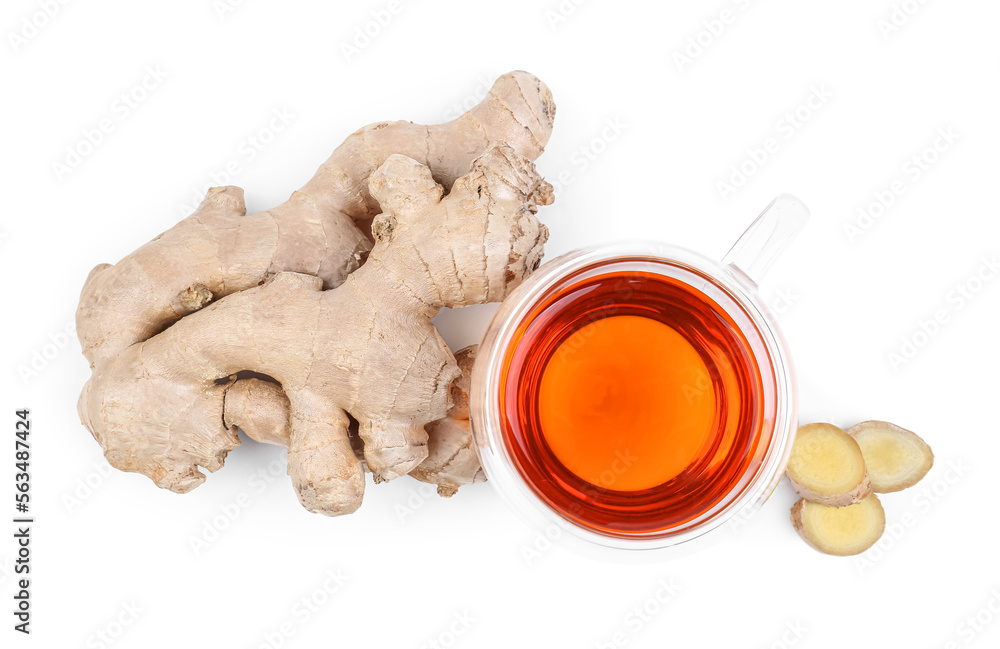Ginger roots and glass cup of black tea isolated on white background