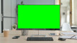 © stockbakers - Computer with Green Screen in Office