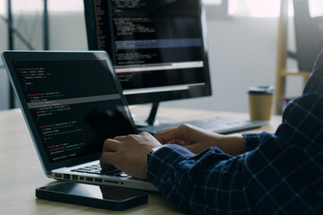 computer programmer working on new software program.coder recruited for solve all the script failure