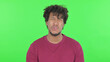 Disappointed African Man Reacting Loss on Green Background
