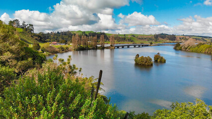 Wall Mural - River and hills of North Island, New Zealand in spring - aerial view