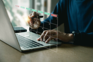 Project management concept , analyst working with computer in management system to make report with KPI and metrics connected to database. corporate strategy for finance, operations, sales, marketing.