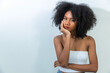 © kanpisut - Portrait of African American woman with bushy curly hairstyle