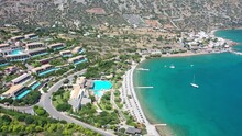 Picturesque Drone View Of Famous Albanian Resort Of Ksamil On Coast Of Ionian Sea With Sandy Beaches And Turquoise Water On Sunny Spring Day
