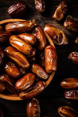 Canvas Print - Ripe dates on a plate. 