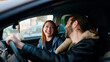 © Krakenimages.com - Man and woman couple smiling confident driving car at street