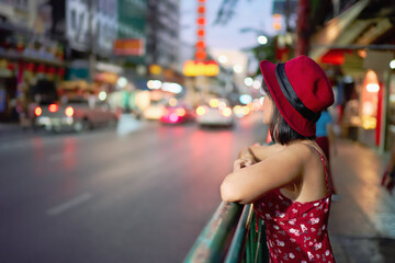 thai woman in red dress and hat visiting yaowarat chinatown bangkok thailand