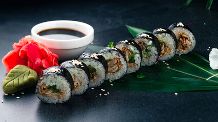 Poster - Maki sushi rolls with smoked eel, cucumber, sesame seeds, soy sauce, wasabi and ginger.