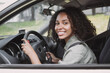 © kite_rin - Smiling young woman driving a car. Beautiful student girl behind the wheel, transportation, car rental, credit, modern lifestyle, business concept