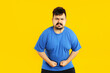 © Atlas - Concept of people, young fat man on yellow background