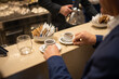 © Vincenzo VAD - Cliente di un bar napoletano mentre viene servito al banco con due caffè espressi in tazzine di ceramica