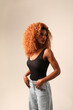 © face_reader_img - Young woman with afro hair posing indoor. Mindset and mental health issues.