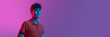 © Lustre Art Group  - Horizontal banner with portrait of young man over background in neon light. Beauty, fashion, youth concept.